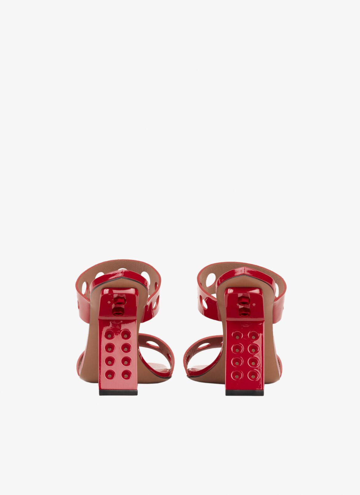 Perforated sandals in patent calfskin ALAÏA LACQUER RED PERFORATED SANDALS IN PATENT CALFSKIN